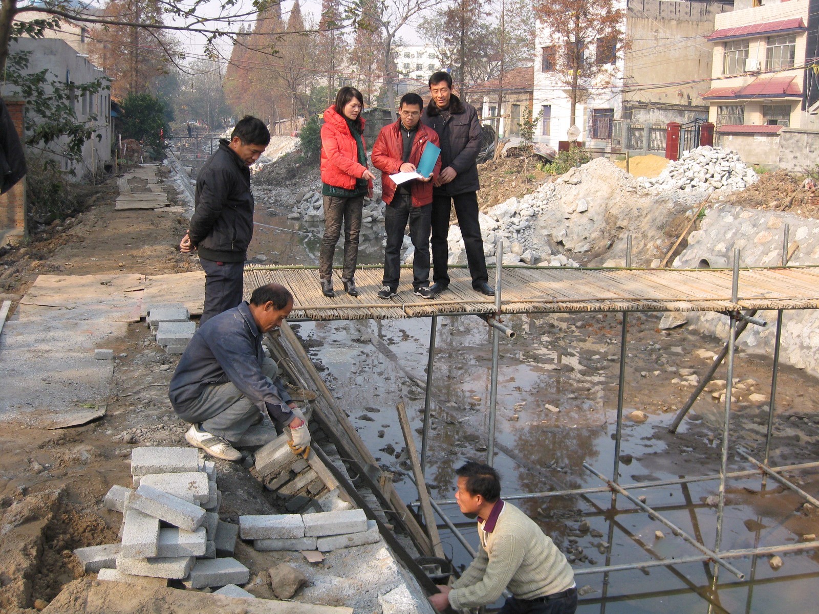 中国审计网:石首市审计局实时跟踪审计城市污